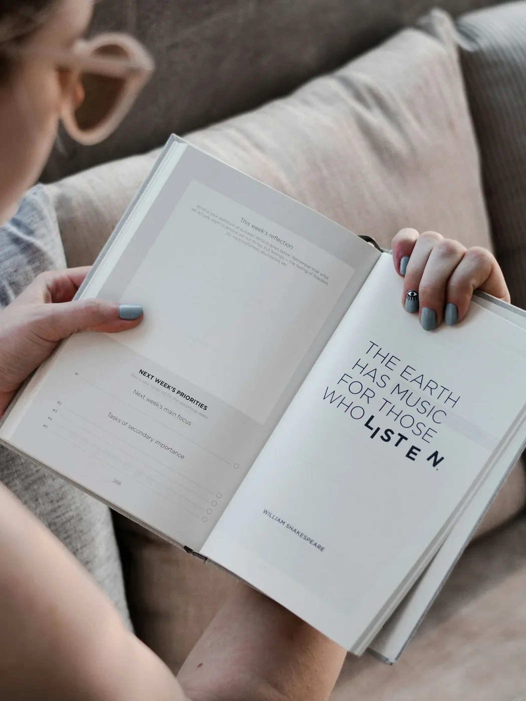 An open book held for reading