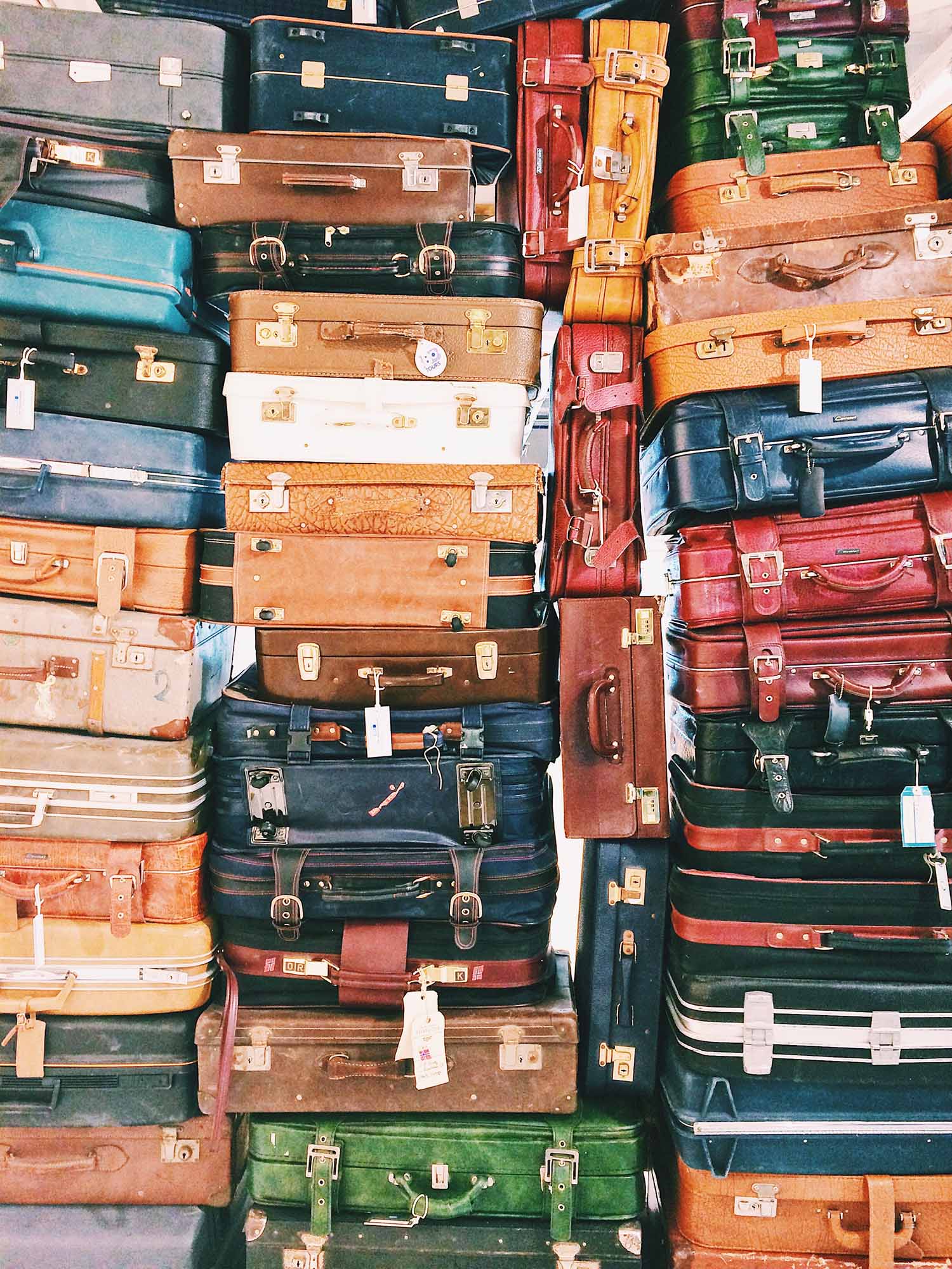 assorted vintage luggage