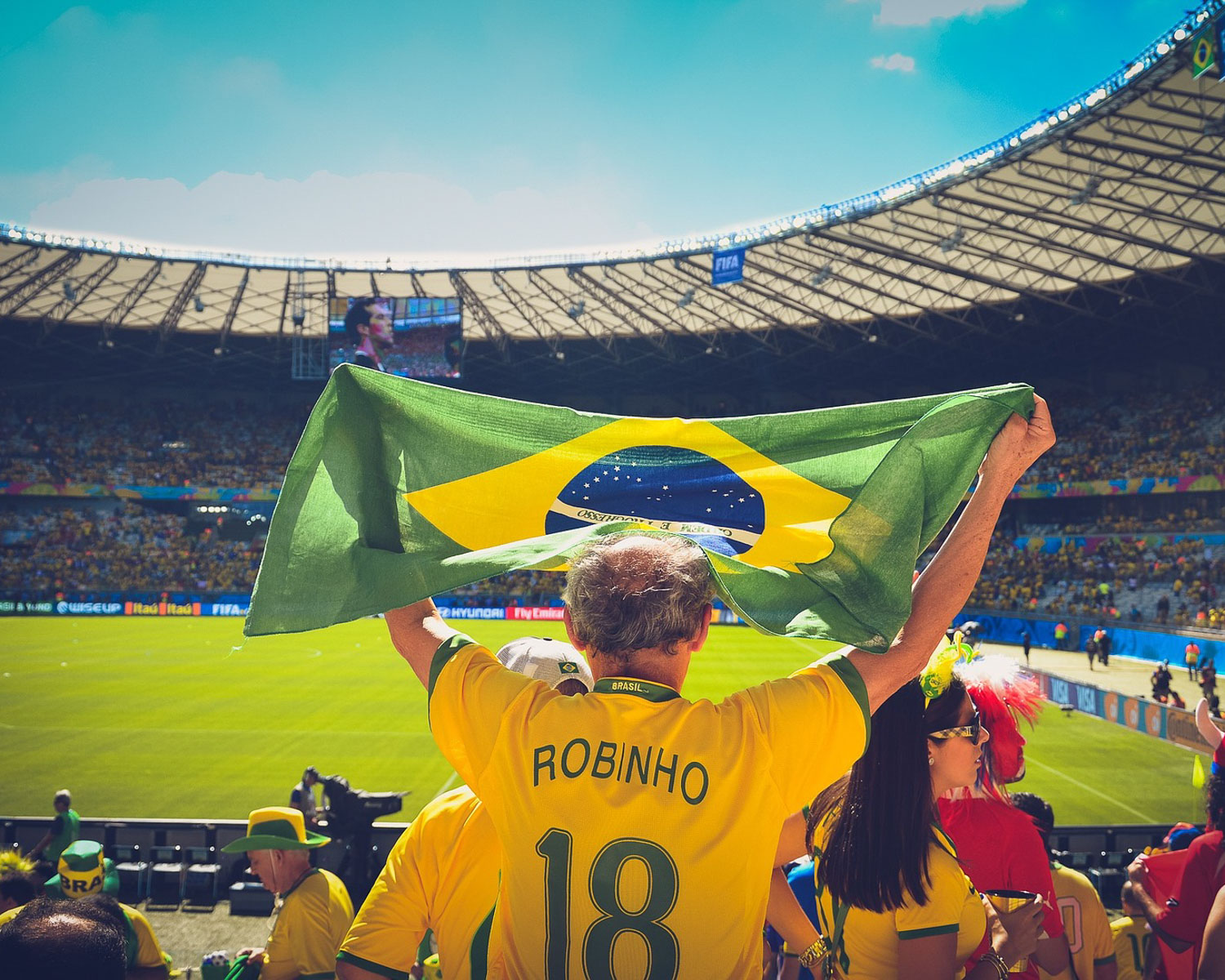 crowd watching brazil soccer team
